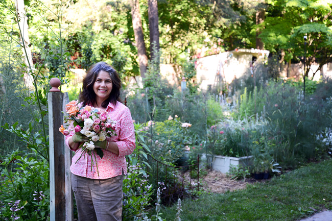 Gloria B. Collins in her cottage garden