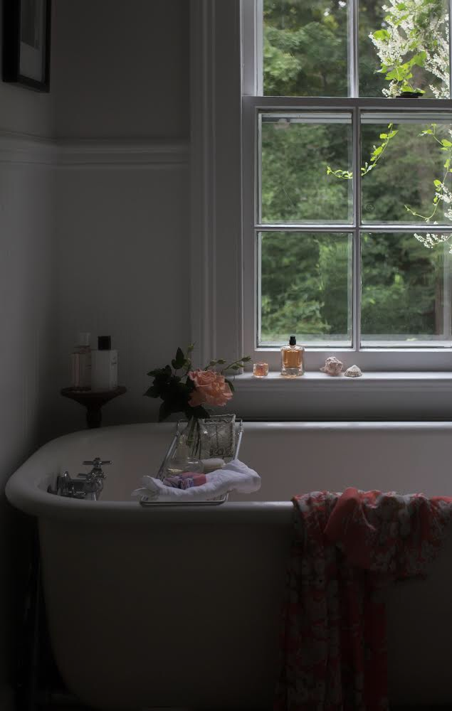 a romantic fall flower arrangement in the bathroom