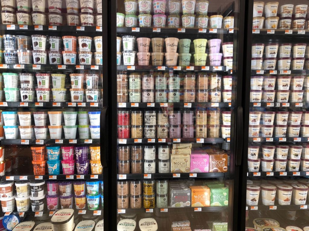 refrigerated display in a grocery store of ice cream