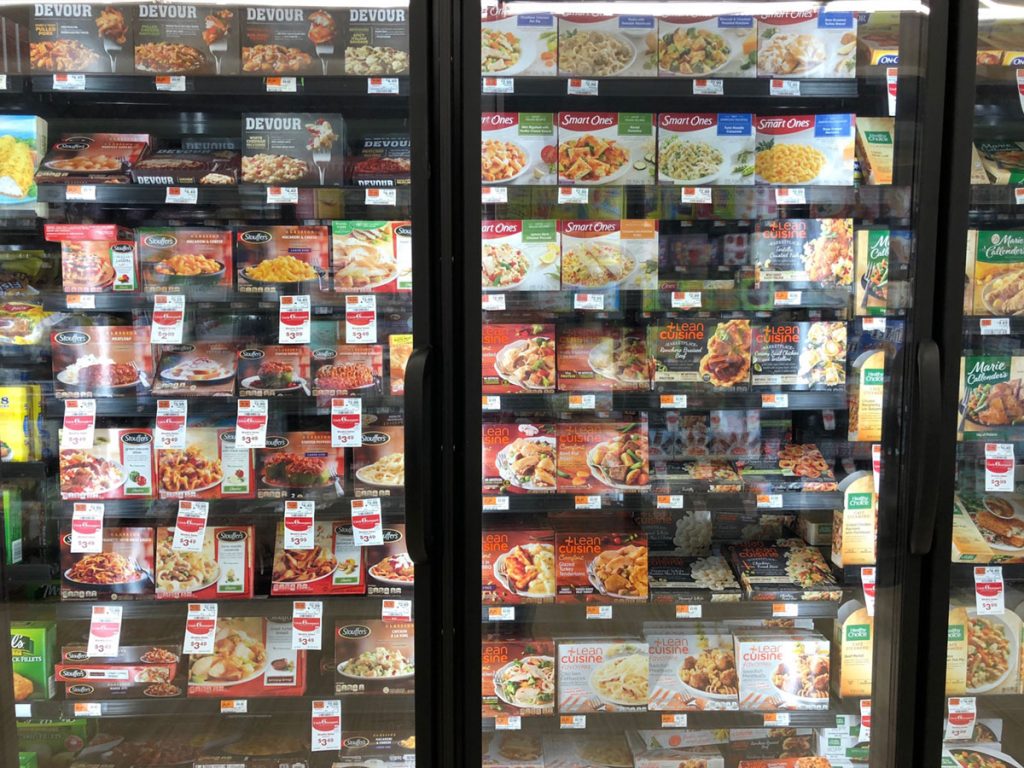 refrigerated display in a grocery store of manufactured food 